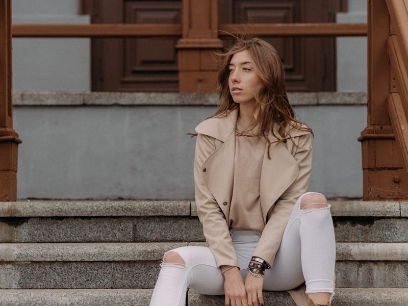 Person doing a tree pose in front of a mirror